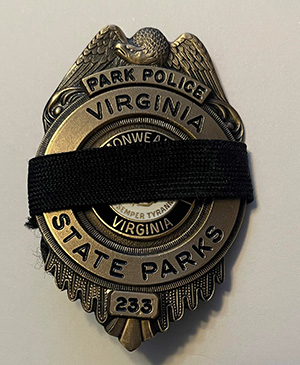 Huy hiệu kiểm lâm thực thi pháp luật